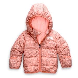 Pink reversible North Face baby puffer jacket
